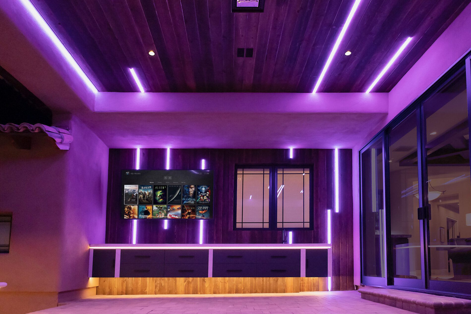 Home theater lounge dimmed for a movie by one-touch automation
