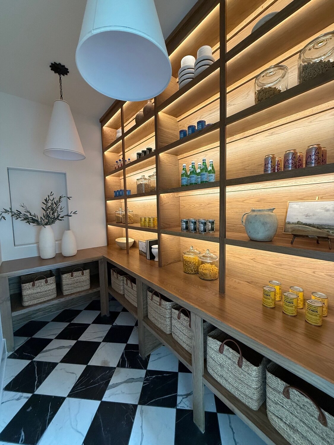Pantry with warm LED backlit shelving