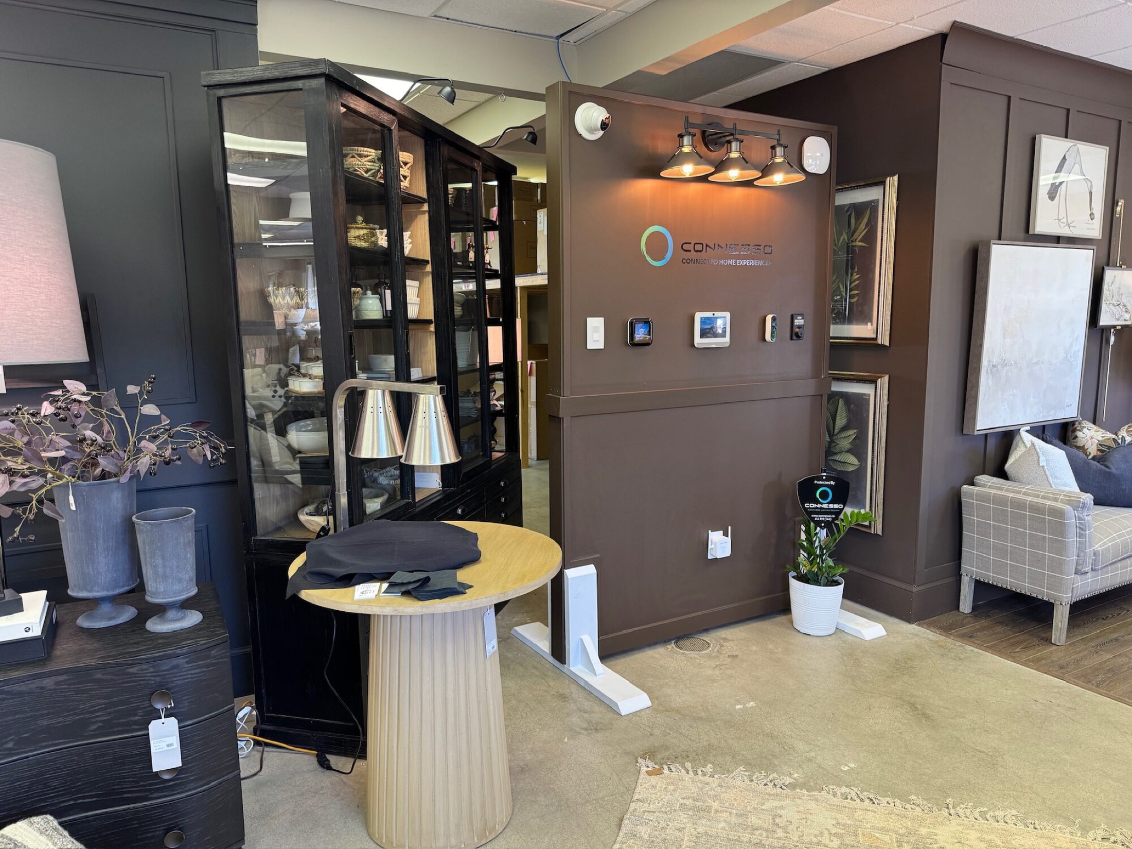 Connesso showroom wall of Lutron lighting keypads and smart home control interfaces