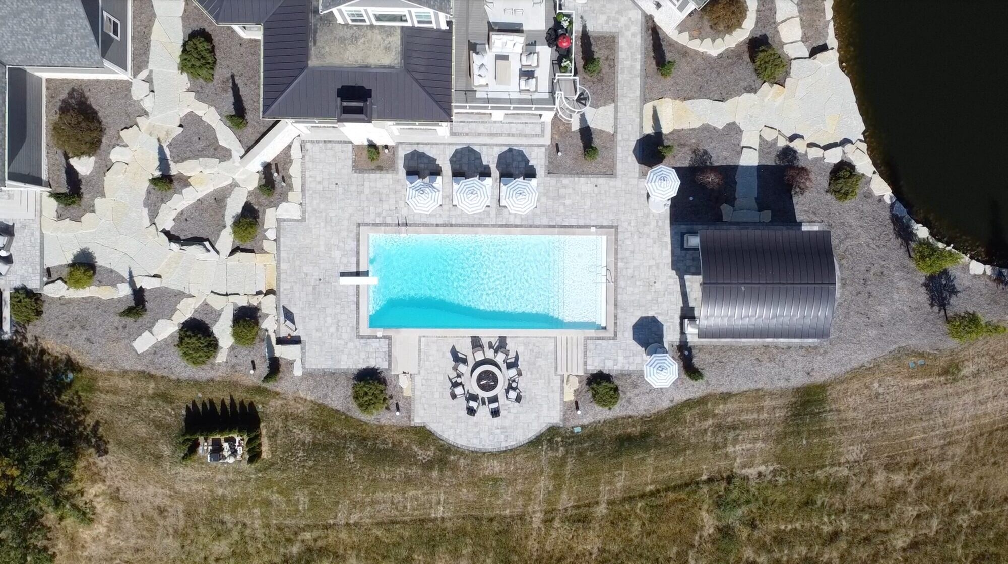 Pool deck with outdoor audio and landscape lighting