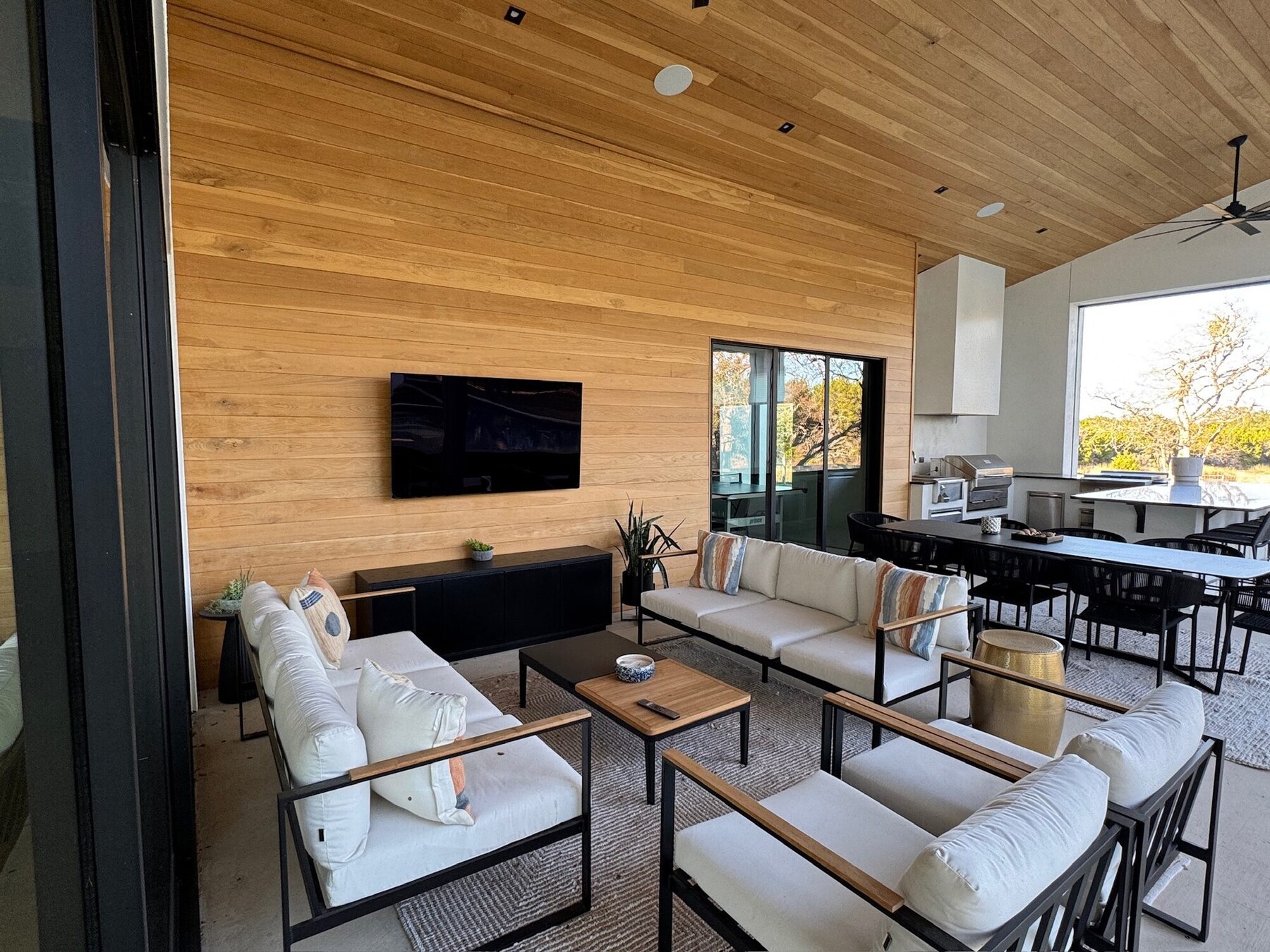 Covered patio with outdoor TV and in-ceiling speakers