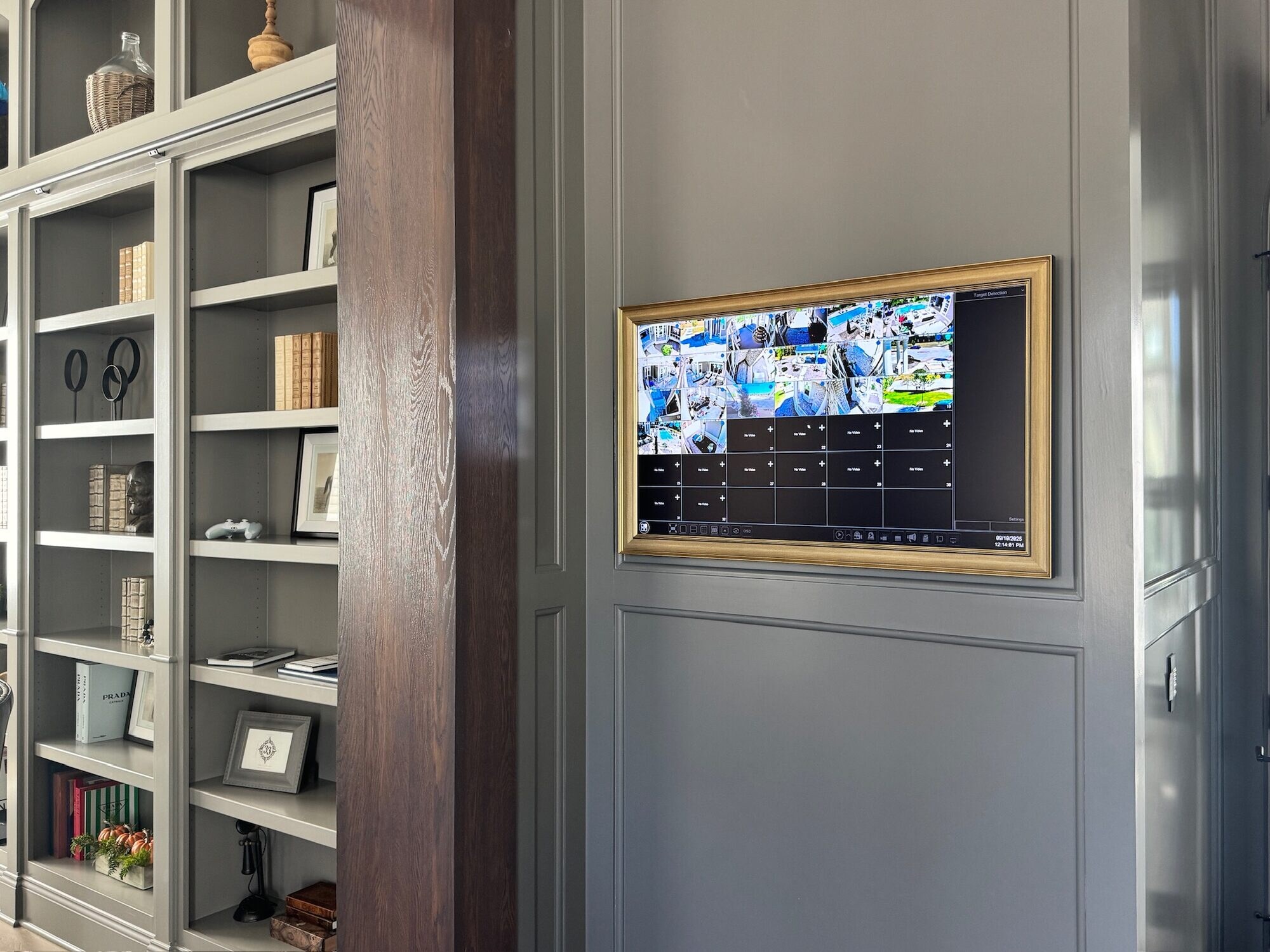 Security cameras feeding a multi-camera display in a built-in bookcase, Galena OH